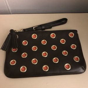 Rare! Coach leather grommet wristlet